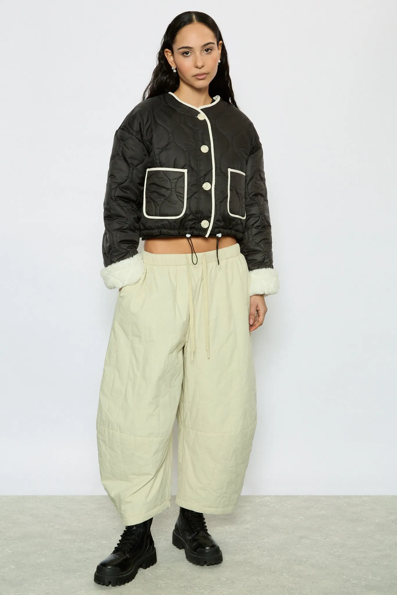 Black and ivory fuzzy lined circle quilted jacket