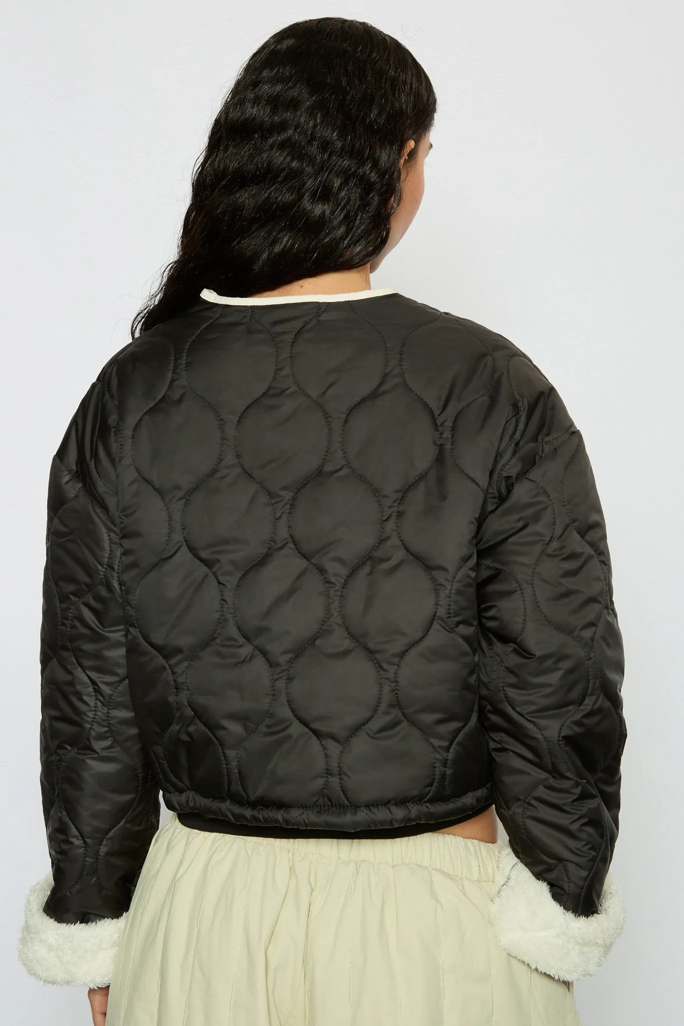Black and ivory fuzzy lined circle quilted jacket